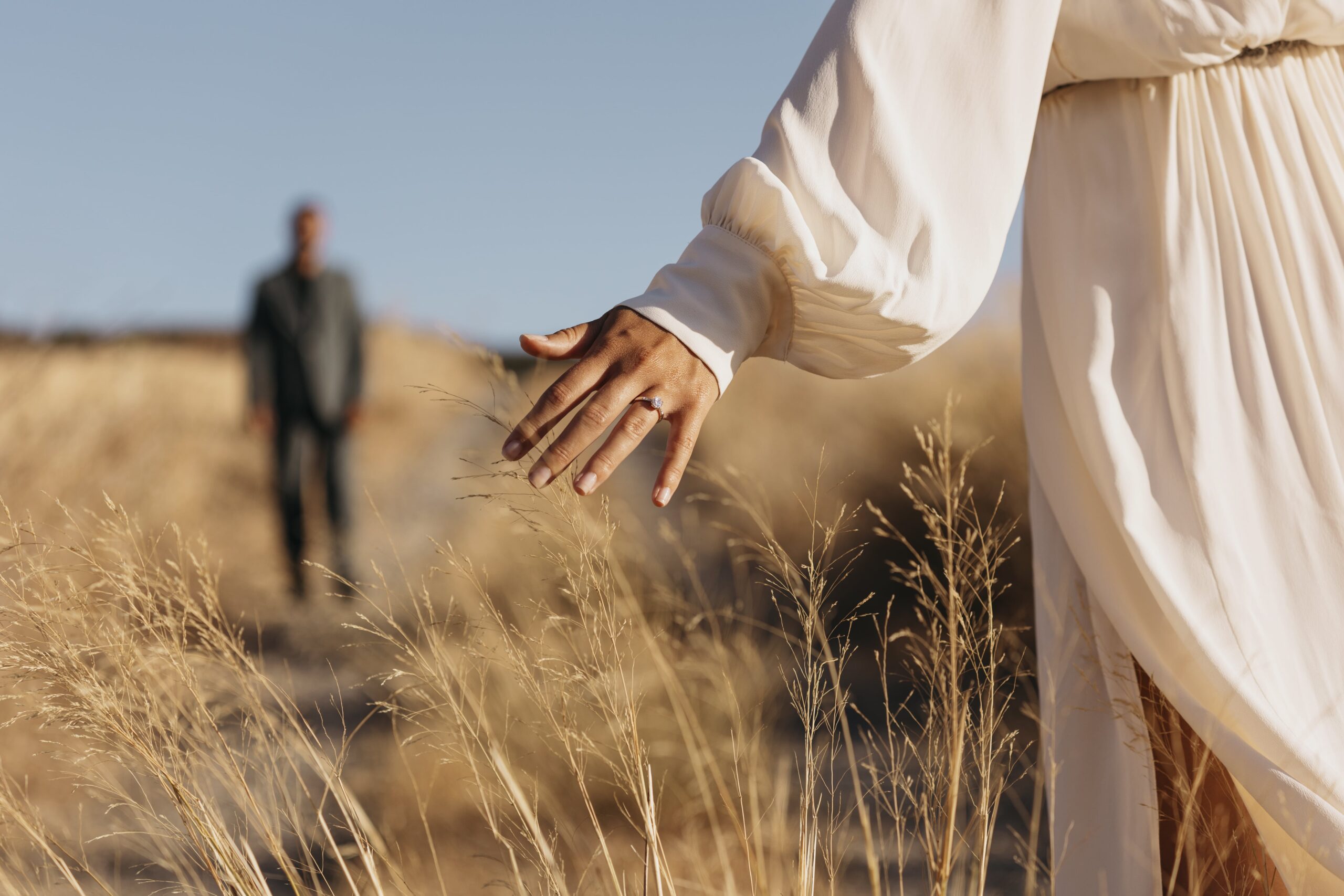 back-view-married-woman-wearing-ring-min