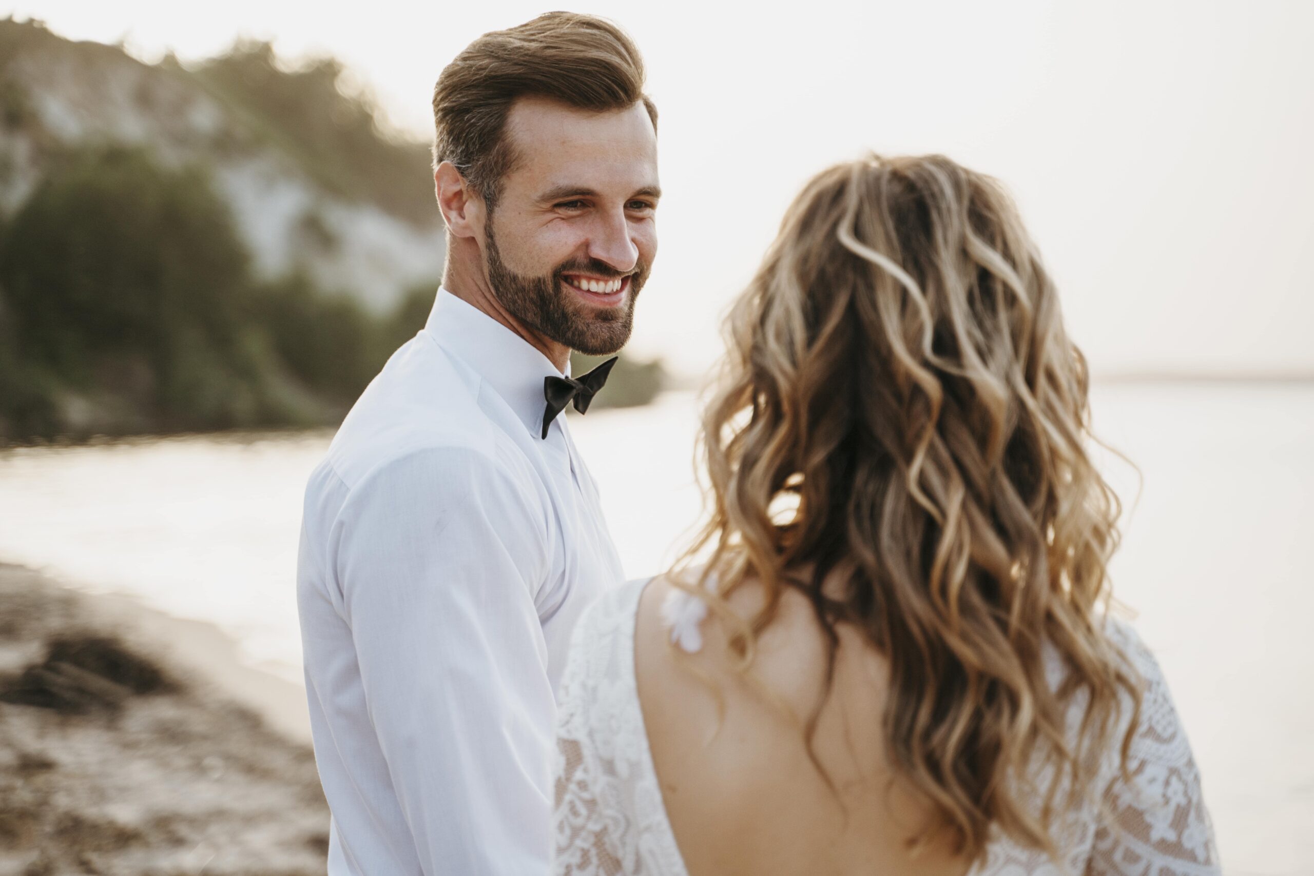 beautiful-couple-having-their-wedding-beach-min