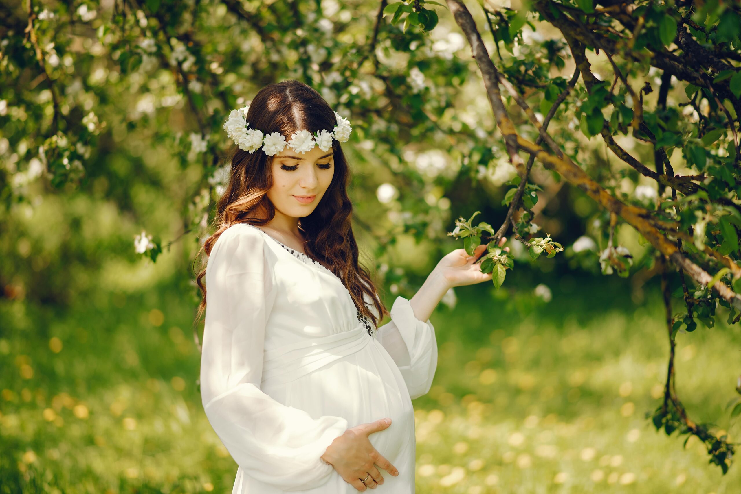 beautiful-young-pregnant-girl-long-white-dress-wreath-her-head (1)-min
