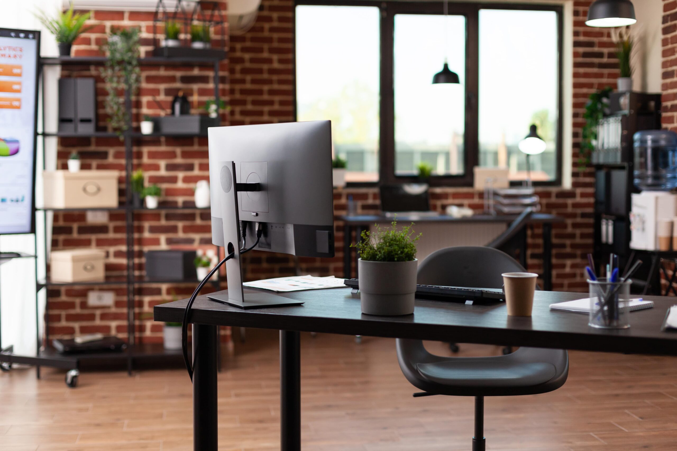 nobody-business-office-with-computer-instruments-desk-empty-startup-space-used-work-company-growth-with-monitor-equipment-no-people-workplace-with-decorations-min